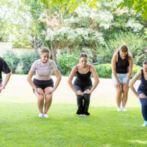 Certified Aviva Method Instructor leading group exercises designed to increase energy levels and improve mood naturally.