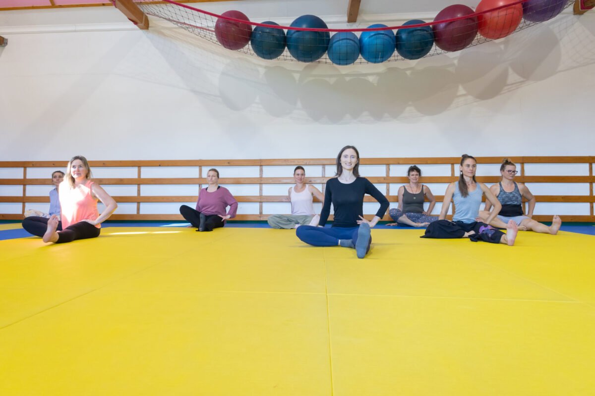 Certified Aviva Method Instructor leading a guided group exercises for hormonal imbalance at Vitality Flame