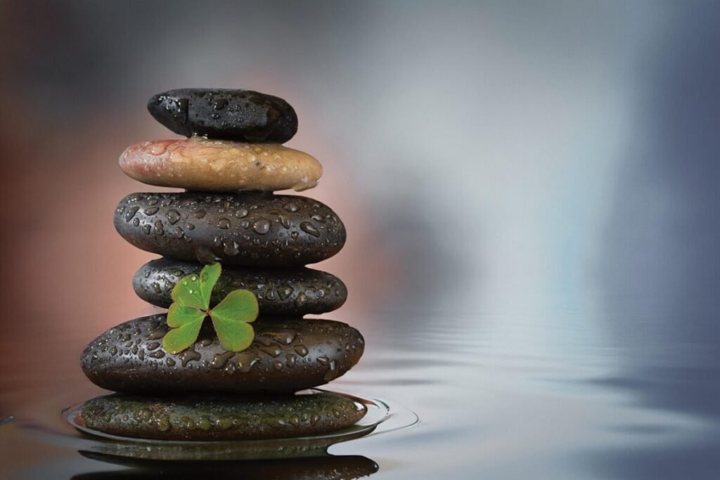 stone balance symbolizing guided relaxation recordings at Vitality Flame designed to calm the mind, ease emotional tension, and support inner balance and wellbeing.